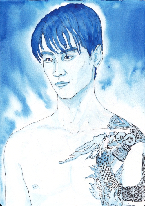 boy with a tattoo in monochromatic blue shades